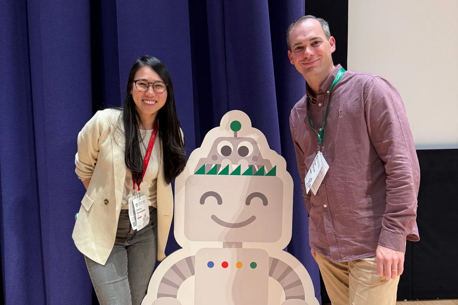 Regan McGregor with Cherry Sireetorn Prommawin, Search Quality Analyst and Webmaster Relationships at Google Asia Pacific, beside the Googlebot mascot at Search Central Live Sydney