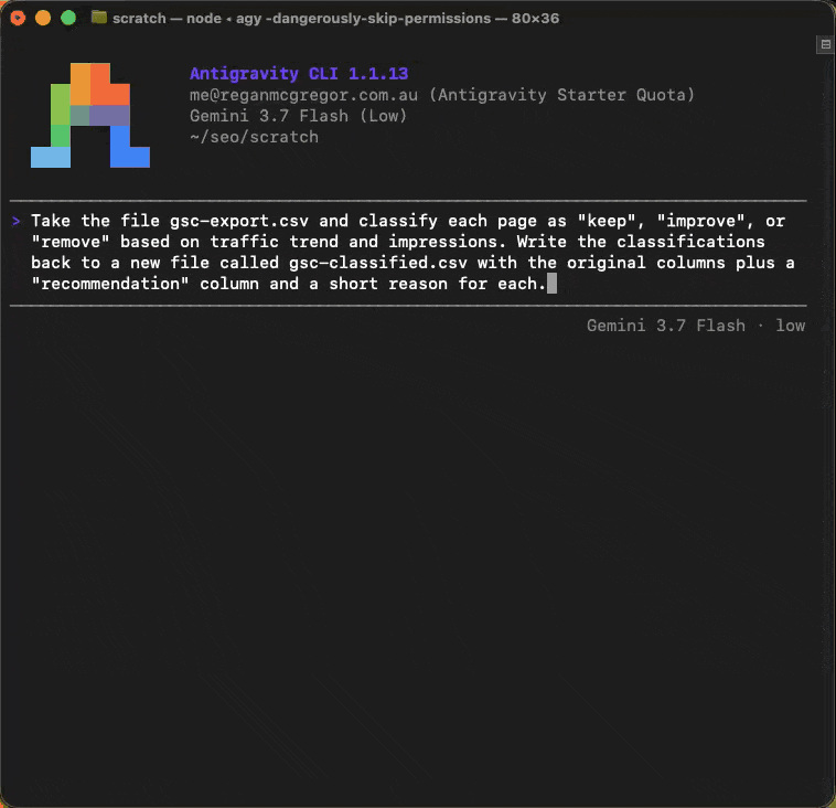 Stage 2: Antigravity CLI classifying a GSC CSV row by row and writing the output file